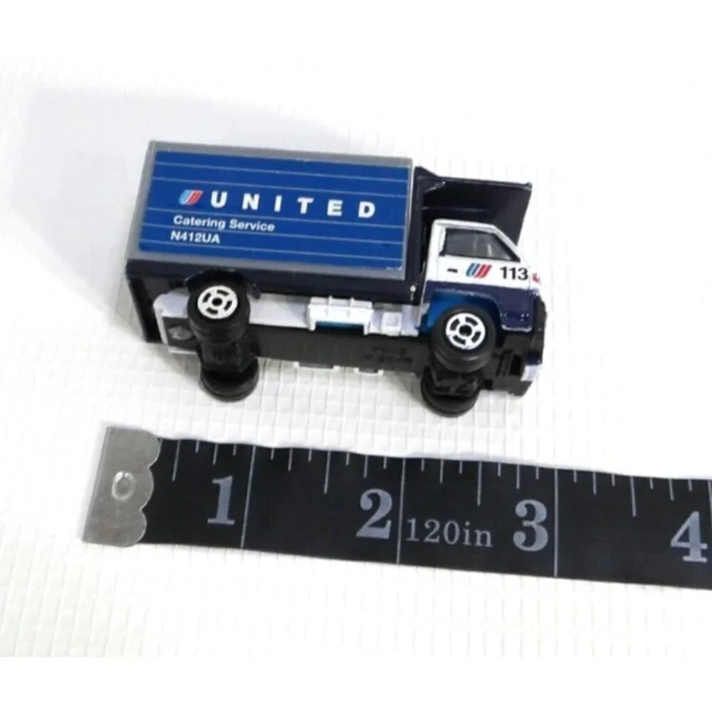 UNITED AIRLINES plastic & metal tiny plane and three trucks set of four vehicles